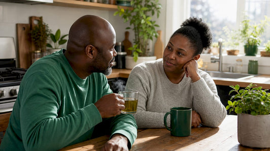 Couple having a supportive conversation on sofa