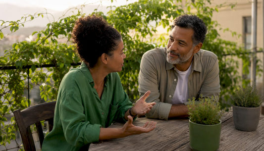 Couple having sincere conversation on sofa